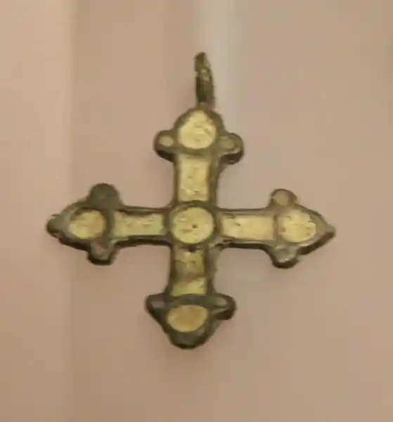 Cross pendant with circles on each tip